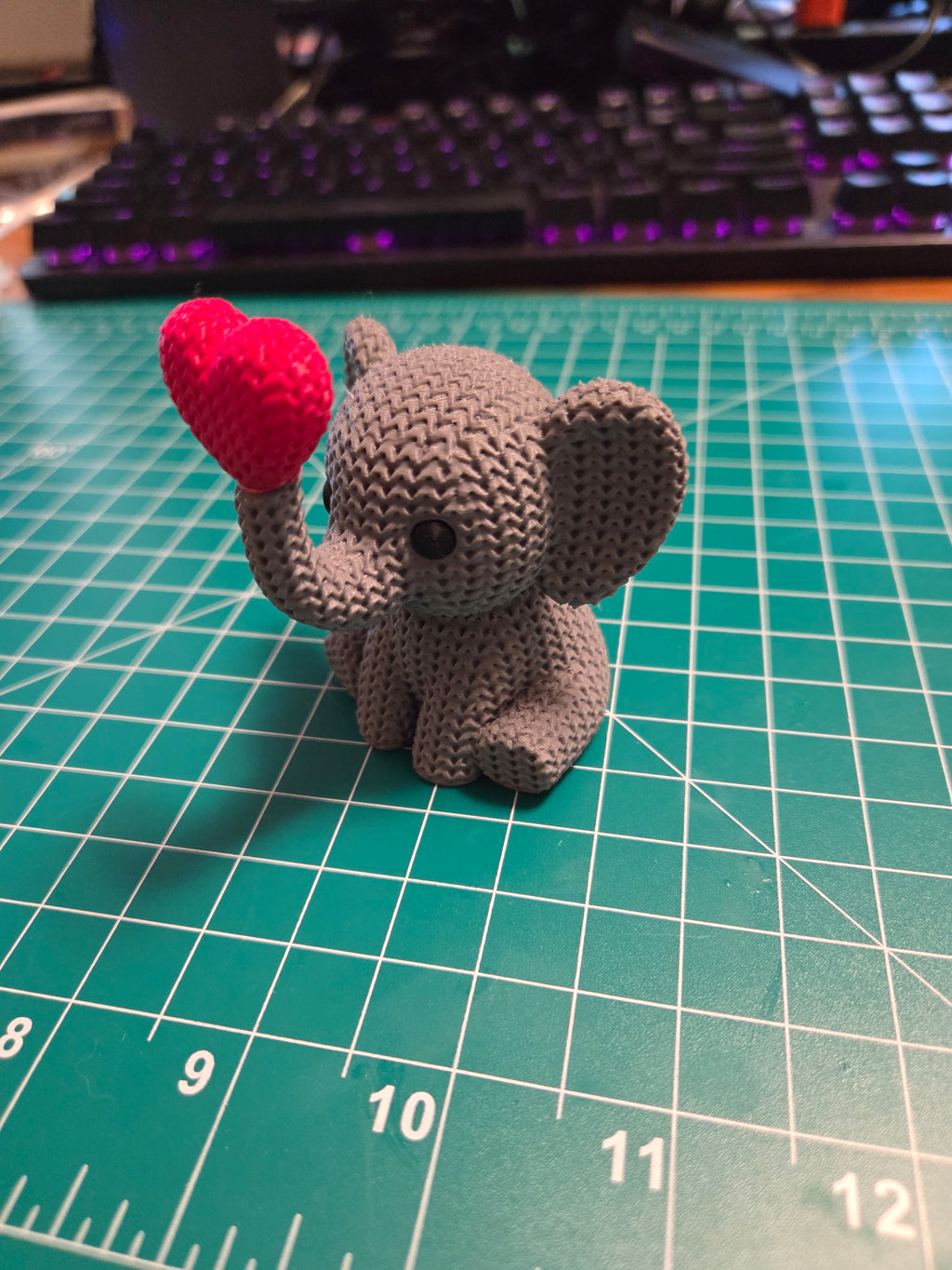 Knitted Texture Elephant Holding Heart Figurine | 3D Printed Animal Decor, Animal Lover Collectible